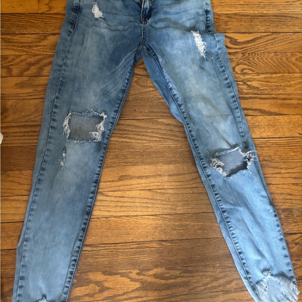 Distressed Blue Jeans